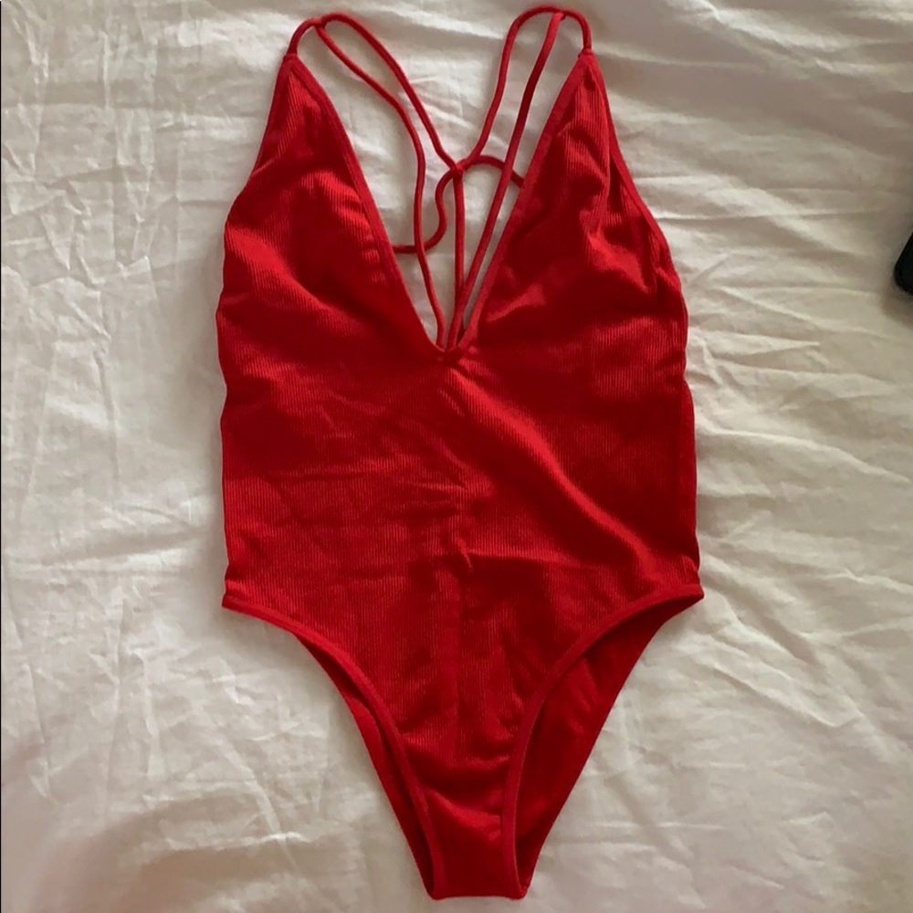 Low back/low V front, stretchy body suit